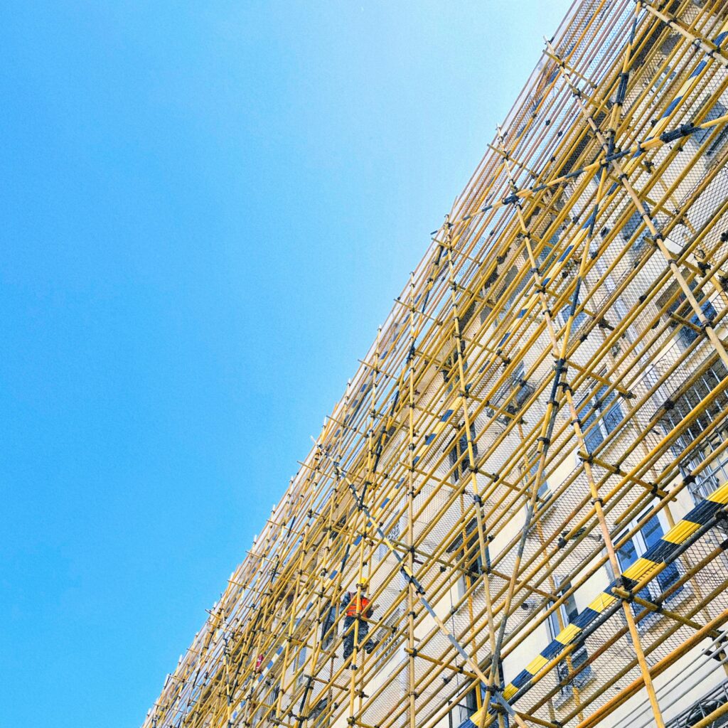 Dynamic scaffolding at a construction site in Shanghai, showcasing modern urban development.